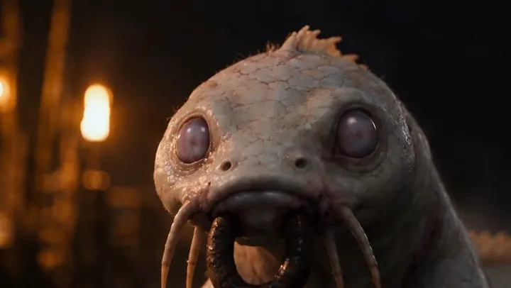 Mere, chalk white with pale pink eyes and an iron ring through its jaw